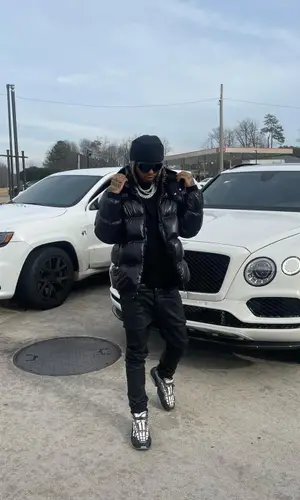 Lil Gnar wearing Moncler jacket