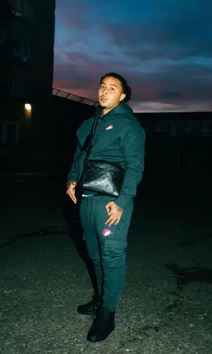 NitoNB wearing Nike sneakers