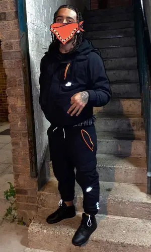 NitoNB wearing Nike jacket
