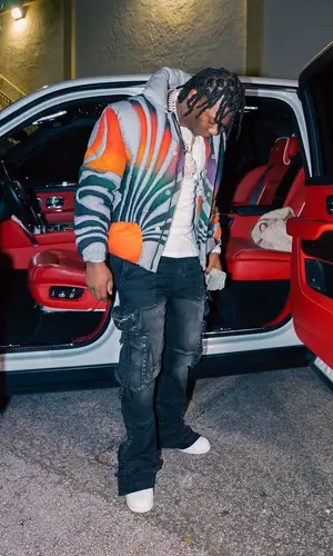 Fredo Bang wearing Amiri jeans