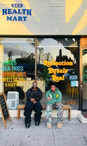 Mustard’s Outfit in Cactus Plant Flea Market Hoodie, ERL Pants & Loewe Boots (2023)