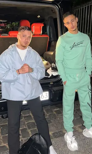 Milano wearing Lacoste pants