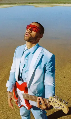 Vic Mensa wearing Louis Vuitton sneakers