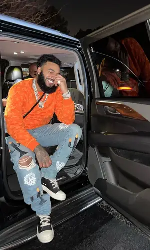 Clarence White wearing Virgil Abloh jeans