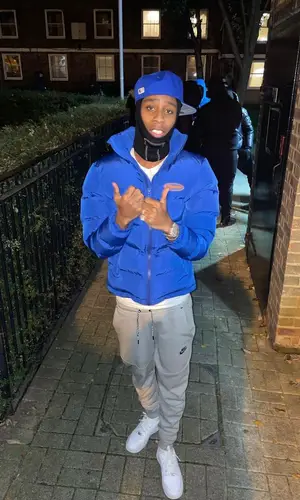Clavish wearing Trapstar jacket
