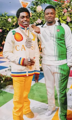 Michael Dapaah wearing Nike sneakers