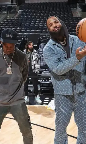 The Game wearing Supreme jacket