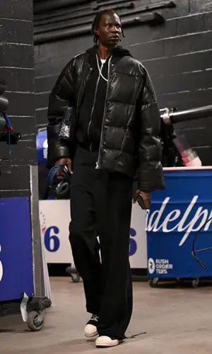 Bol Bol’s Outfit in Rick Owens Jacket, Goyard Bag & Apple (2023)