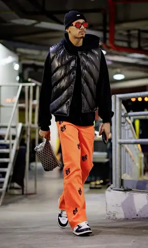 Juan Toscano-Anderson’s Outfit in Rough. Jacket, Louis Vuitton Eyewear & Kith Hat (2023)