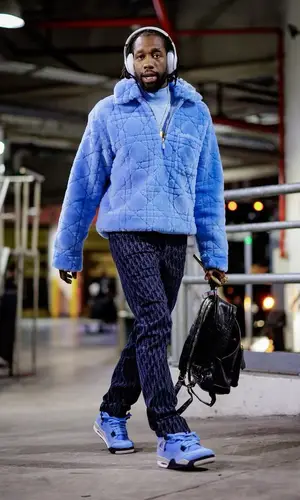 Patrick Beverley wearing Tom Ford backpack