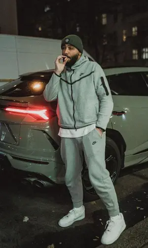 Samra wearing Nike pants