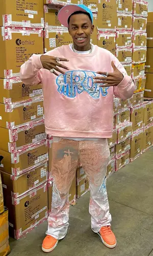Cocash wearing Who Decides War pants