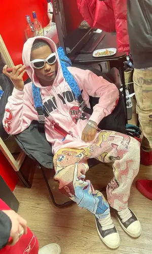 Yvngxchris’ Outfit in Hellcat NYC Hoodie, Rick Owens Sneakers & Violate Club Eyewear (2022)