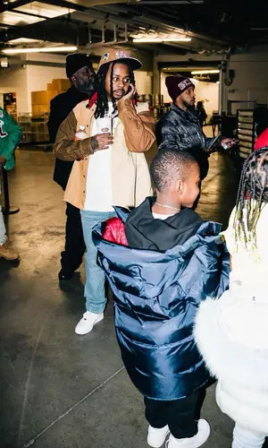 Babyface Ray wearing Amiri jeans