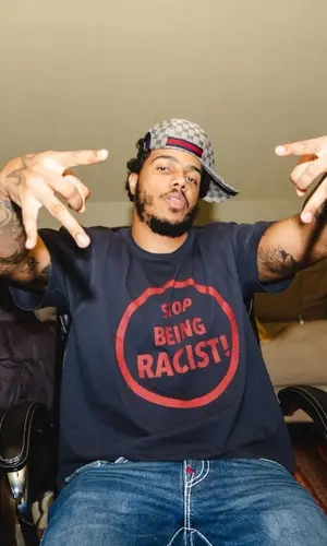 AJ Tracey’s Outfit in Gallery Dept. T-Shirt, True Religion Jeans & Gucci Cap (2023)