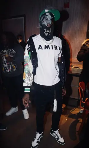 PGF Nuk’s Outfit in Amiri T-Shirt, Purple Brand Jeans & Nike Sneakers (2023)