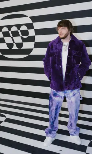 Murda Beatz wearing Amiri shirt