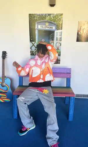 Jaden Smith’s Outfit in ERL Jacket, MSFTSrep Jeans & New Balance Sneakers (2023)