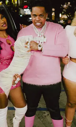 Finesse2tymes wearing Givenchy sweater