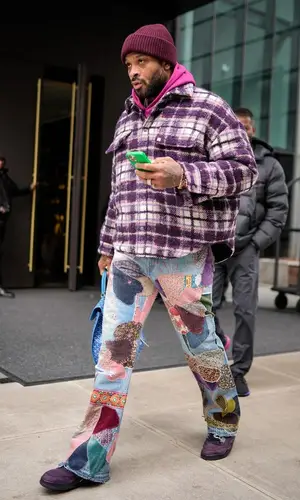 PJ Tucker’s Outfit in Amiri Shirt, Kapital Jeans & Goyard Backpack (2023)