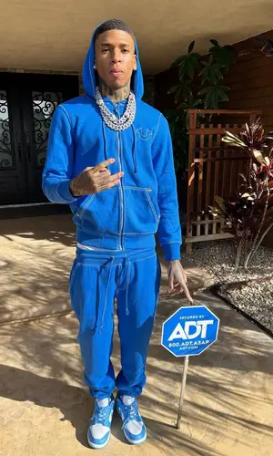NLE Choppa wearing True Religion pants