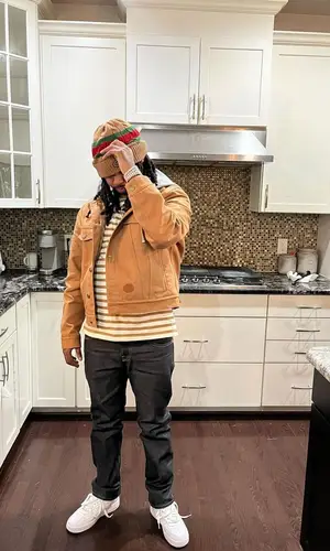 Babyface Ray wearing Gucci hat