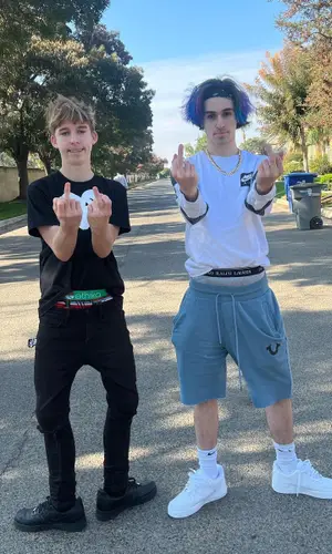Lil Maceee wearing Supreme sneakers