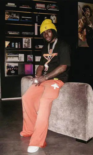 Lil Dann’s Outfit in Awful Lot of Cough Syrup T-Shirt, Vertabrae Pants & Louis Vuitton Hat (2023)