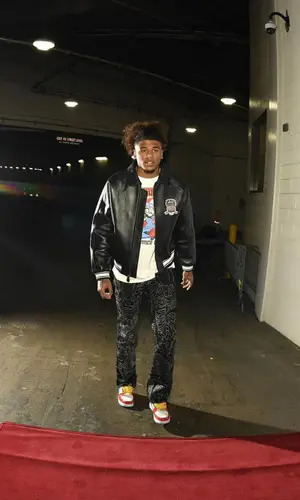 Jalen Green’s Outfit in Avirex Jacket, Who Decides War Jeans & Hello Kitty Sneakers (2023)