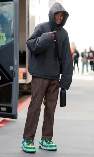 Jalen Green wearing Louis Vuitton bag