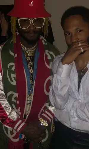 Thundercat wearing Gucci eyewear