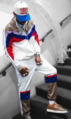 Fabolous wearing Goyard backpack