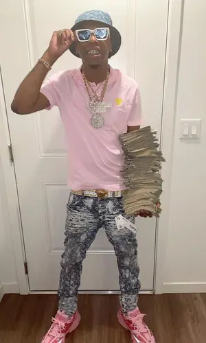 Goldenboy Countup wearing Louis Vuitton cap