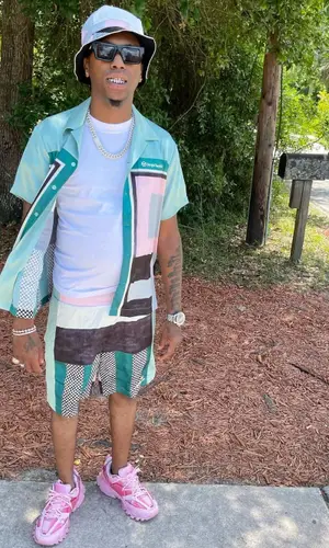 Goldenboy Countup wearing Sergio Tacchini shirt