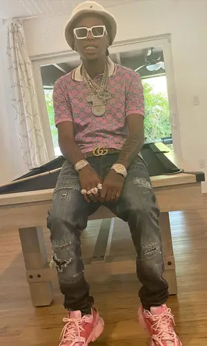 Goldenboy Countup wearing Gucci belt