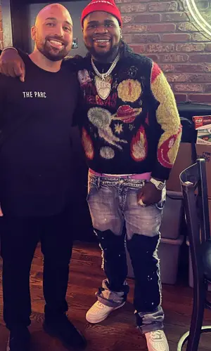 Fat Boy wearing Money Dreams hoody