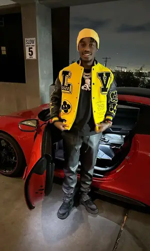 Lil Tjay wearing Rta pants