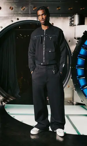 Shai wearing Reese Cooper trousers