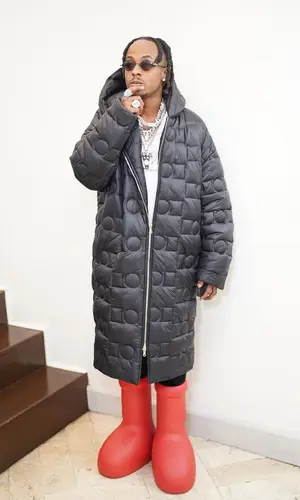Rich The Kid wearing MSCHF boots
