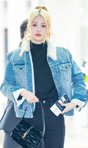 Yunjin Le Sserafim wearing Saint Laurent sweater