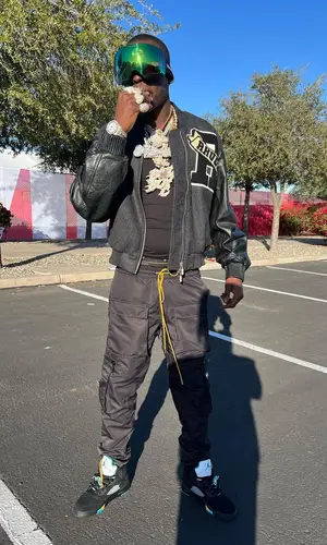 Bobby Shmurda wearing Prada eyewear