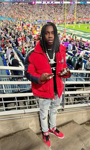 Polo G wearing Jordan boots