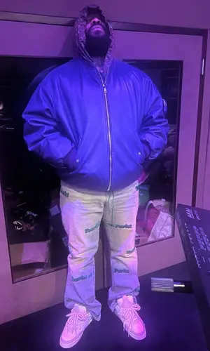ASAP Bari wearing Louis Vuitton jeans
