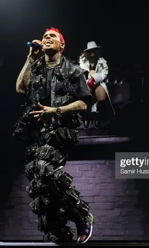 Chris Brown wearing Marc Jacques Burton trousers