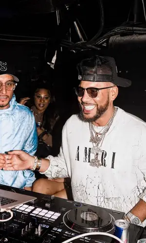 DJ Drama wearing Amiri sweatshirt