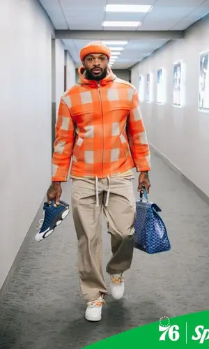PJ Tucker wearing Goyard backpack