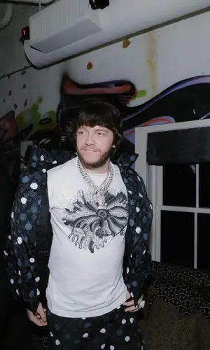 Murda Beatz wearing Louis Vuitton pants