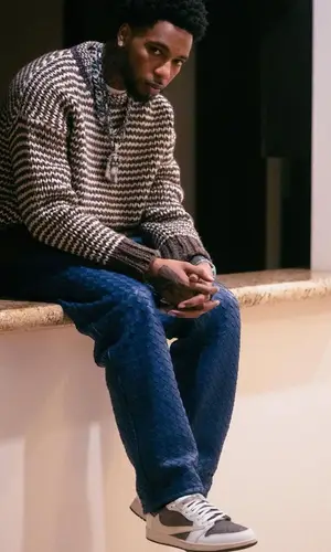 Key Glock wearing Bottega Veneta sweater