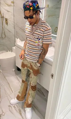 Lil Migo wearing Nike sneakers