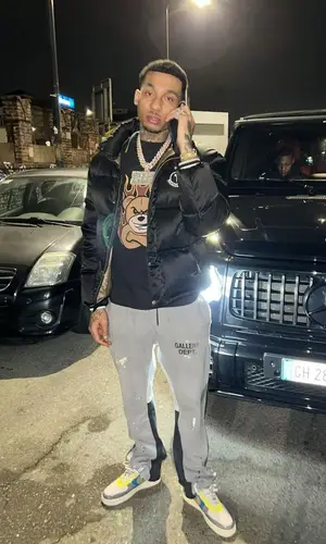 Fredo’s Outfit in Moncler Jacket, Gallery Dept. Pants & Palm Angels (2023)